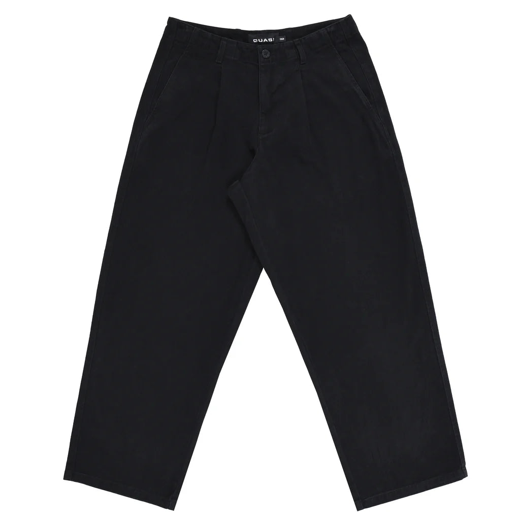 Pantalon Quasi Warren pour skateboard en noir, coupe décontractée, tissu durable, porté sur mannequin.