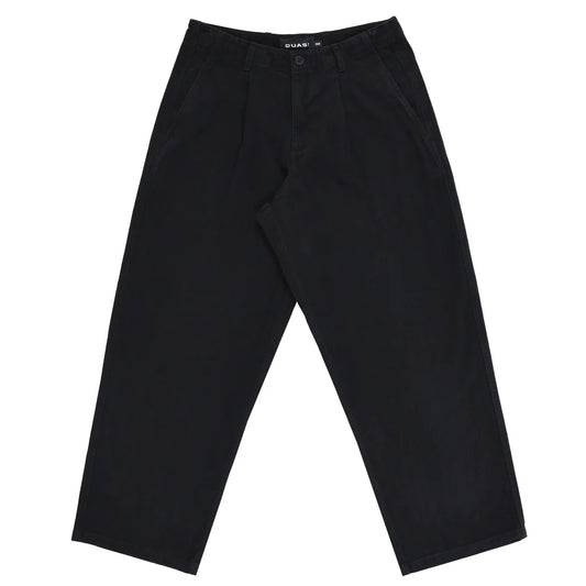 Pantalon Quasi Warren pour skateboard en noir, coupe décontractée, tissu durable, porté sur mannequin.