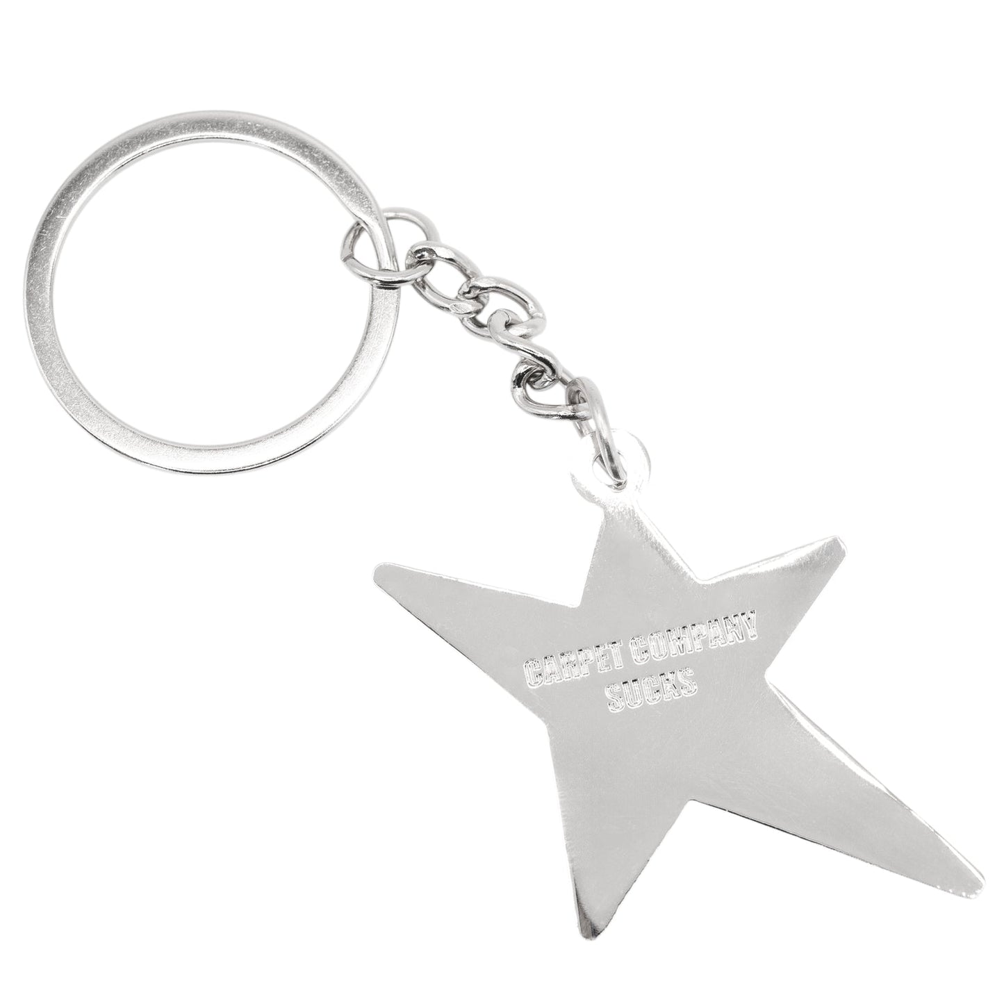 Porte-clé en forme d’étoile C-Star de la marque Carpet, accessoire coloré avec détails en relief sur une surface en plastique.